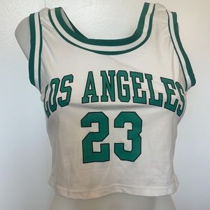 Romwe Crop top for women. Size large. Los Angeles 23 on front.sleeveless sexy